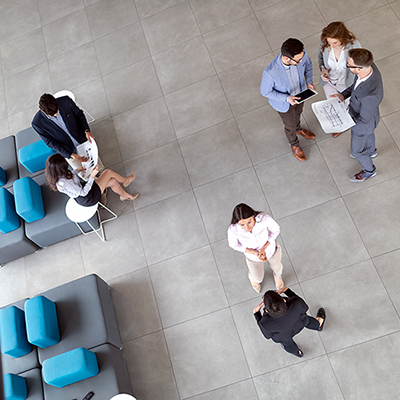 Above shot of Teapot Media team members discussing strategies